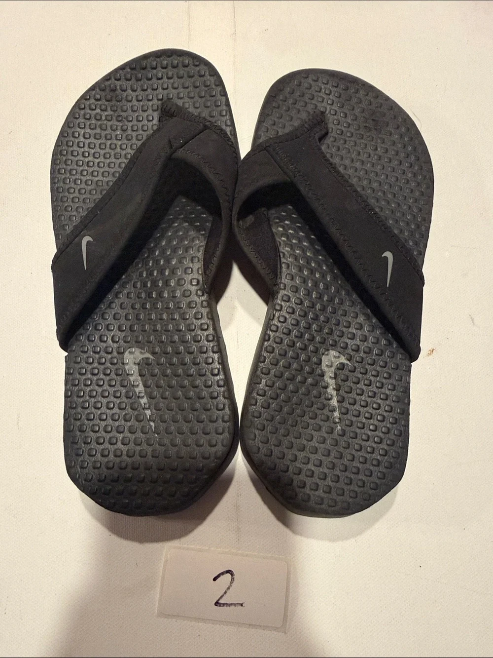 Nike Kids Black Slide Sandals with Grey Swoosh